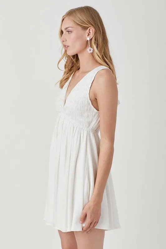 IN THE LIGHT V NECK SMOCK SLEEVELESS DRESS